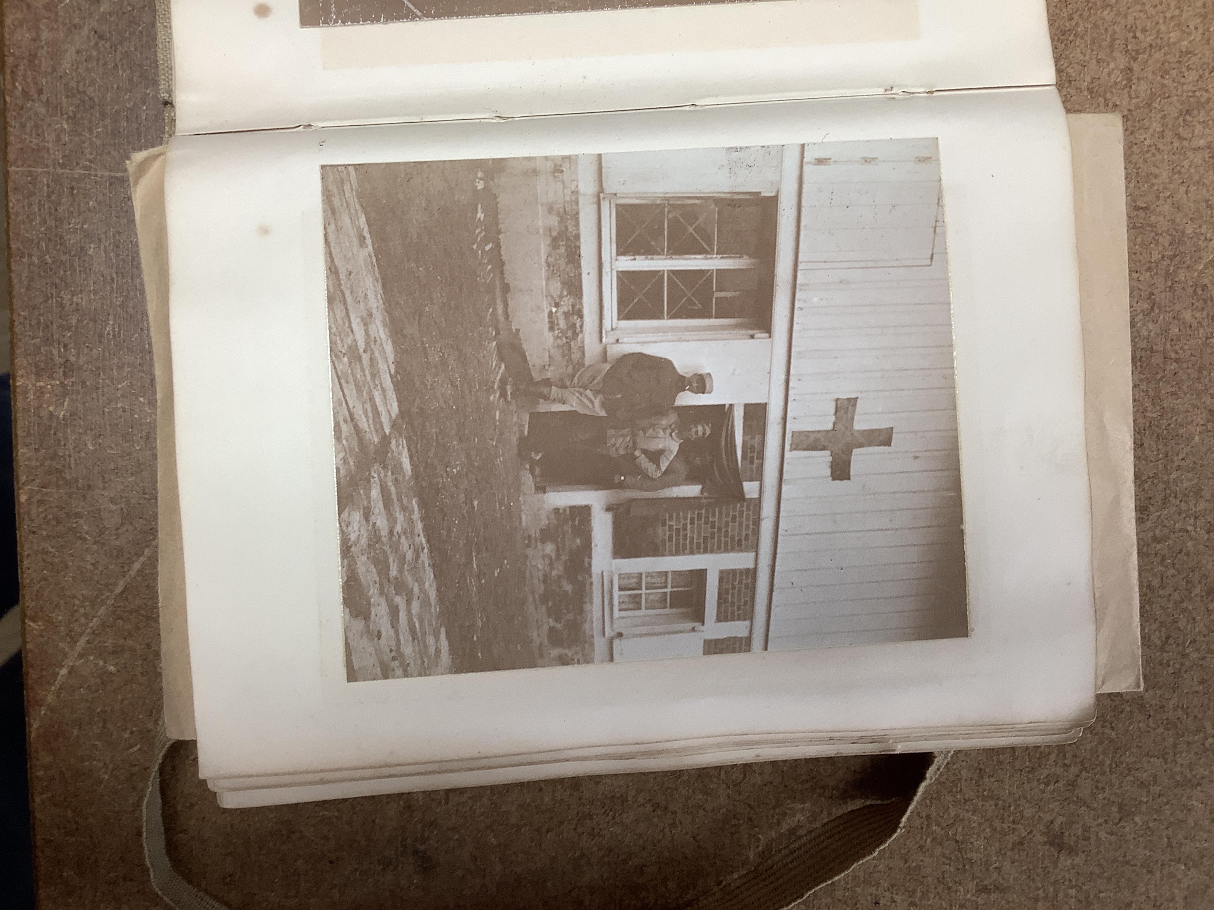 A WWI Ambulance and Balloon Brigade photograph album, pocket watch, coin, etc. Condition - fair, pocket watch ticks when wound
